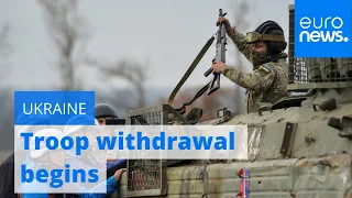 Ukraine and Russian-backed rebels begin troop withdrawal in eastern regions