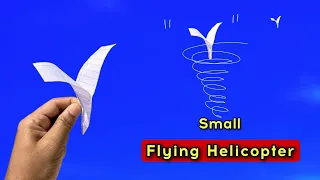 helicopter toy flying, notebook paper flying toy, how to make paper helicopter, flying arrow toy
