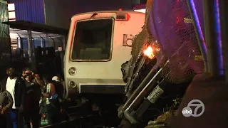 BART train hits truck that crashed onto tracks, causing passenger evacuations and several injuries