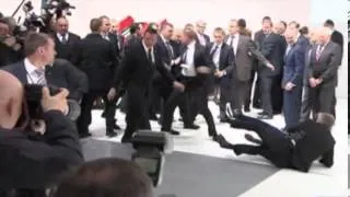 Topless protesters confront Vladimir Putin and Angela Merkel