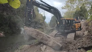 Building A Road Down The Mountain To Dam Up An Abandon Quarry
