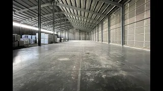 Промышленный бетонный пол с упрочненным верхним слоем в Мытищах (склад)