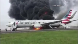 American Airlines plane catches fire on runway