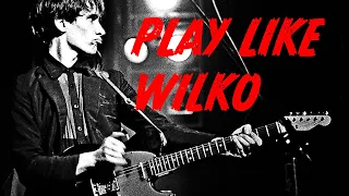 Adrian attempts...to play like Wilko Johnson