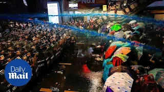 Water cannons used by police on Thailand protesters in Bangkok