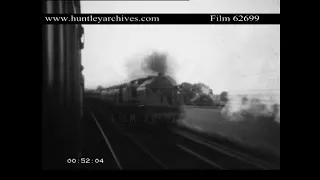 Steam Train overtakes another, 1930's.  Archive film 62699