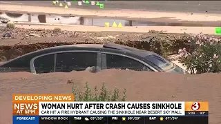Car ends up in a sink hole after Phoenix crash