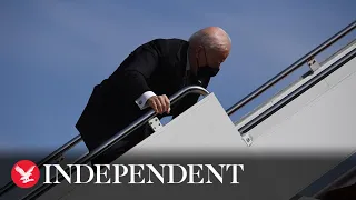 Biden falls three times up steps to Air Force One