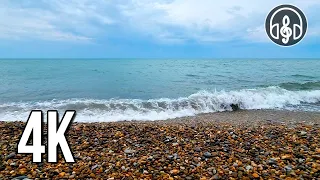 Sounds of rolling sea waves on a pebble beach. High sound quality.