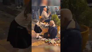 Little girl gives water to homeless man ❤️