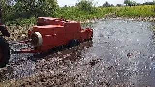 Т 25 с прес подборщиком через воду