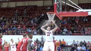 Nick Minnerath University of Detroit Mercy Titans dunks on defender