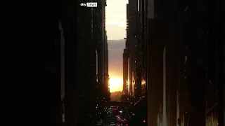 Crowds gathered in New York to watch the bi-annual 'Manhattanhenge' sunset