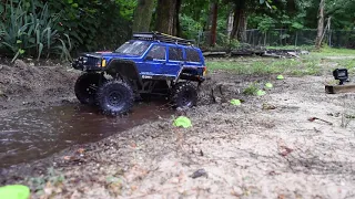 Axial SCX10ii Cherokee Mud Truck In Action!