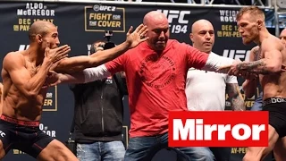 UFC 194 McGregor vs Aldo INTENSE staredown at weigh-ins