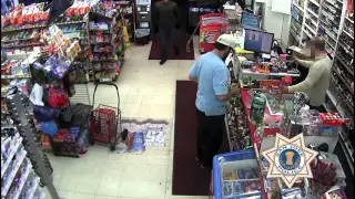 Armed Robbery Surveillance Video - Public's assistance needed identifying a suspect