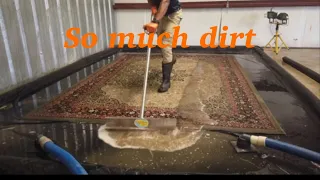 Squeegeeing DIRTY water out of an Area rug after agitation