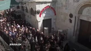 Orthodox Christian pilgrims mark Good Friday in the Old City of Jerusalem