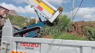 Yanmar C10R loading a dump truck