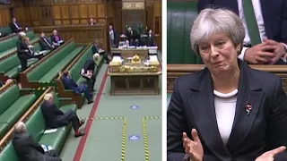 Boris Johnson walks out during Theresa May's speech criticising lockdown