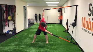 Thoracic Spine Rotation Wall Drill - Stick Mobility Exercise