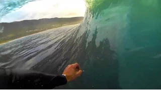 Surfing Barrel gopro POV - Sunrise slow motion