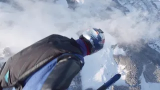 Spectacular wingsuit and paraglide flight down Kitzbuhel ski course