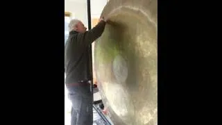 Bear Sound Testing Giant Gong for The Big Bang Experience