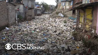 Innovative young Kenyan scientist is turning Nairobi's mountain of plastic waste into paving bric…