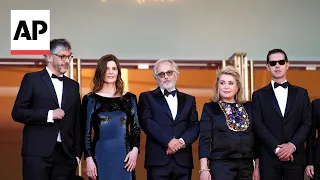 Catherine Deneuve and Chiara Mastroianni arrive for Cannes premiere of 'Marcello Mio'