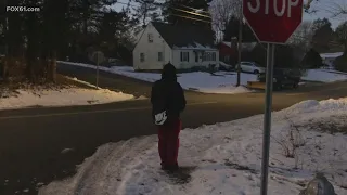 Students waiting for the bus in the cold