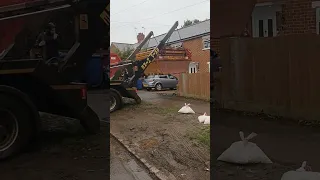 How they drop a 6 yard Skip in your driveway in England.