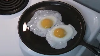 Seasoning Lodge Cast Iron Griddle on Stove Top with Bacon Grease