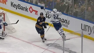 Auston Matthews gloves puck down, nets wraparound