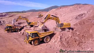 Opening up a new quarry with pair of CAT 395 Excavators
