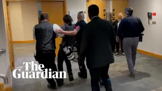 ‘I didn’t do anything!’: press photographer dragged out of Conservative party conference