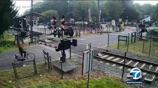 Woman barely escapes being hit by train in Netherlands I ABC7