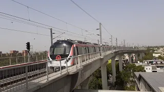 Delhi Metro Pink Line train arrives at Mayur Vihar POCKET 1 station