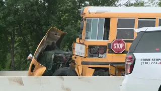 Three hurt after downtown-area crash involving school bus, officials say