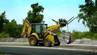 Cat® 420 XE Backhoe Loader at Work (North America)