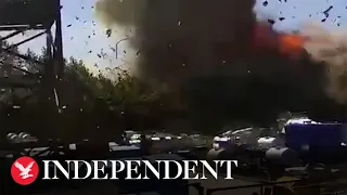 Moment Russian missile hits Ukrainian shopping centre