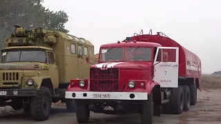 An old fuel truck in an unusual role. Firefighter KRAZ-258 at Cherkassy airport with a wooden cabin.