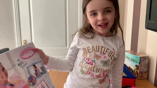 Kate unboxing her new Baby Annabell Cocoon Carrier