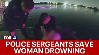 Police sergeants save woman drowning in sinking car