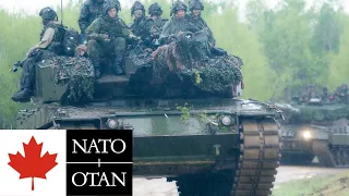 Canadian Army, NATO. Leopard 2A4 tanks and soldiers during combat exercises.