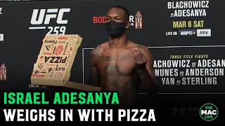 Israel Adesanya weighs in with pizza for light heavyweight debut at UFC 259