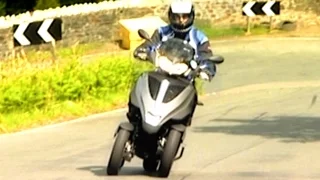 Taking On The Isle Of Man TT On A 3 Wheeled Scooter #TBT - Fifth Gear