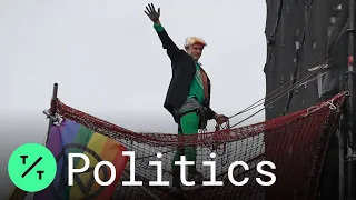 Extinction Rebellion Protester Climbs London's Big Ben