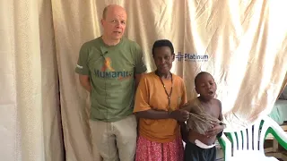 Nick with Mathius & his mum following his surgery