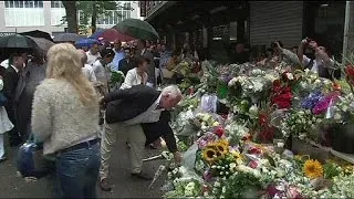 Dutch mourners march through Rotterdam in silent tribute to flight MH17 victims